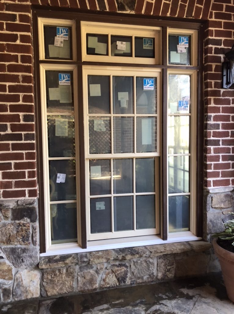 Replaced the French doors with a window and matched the stone on the outside.